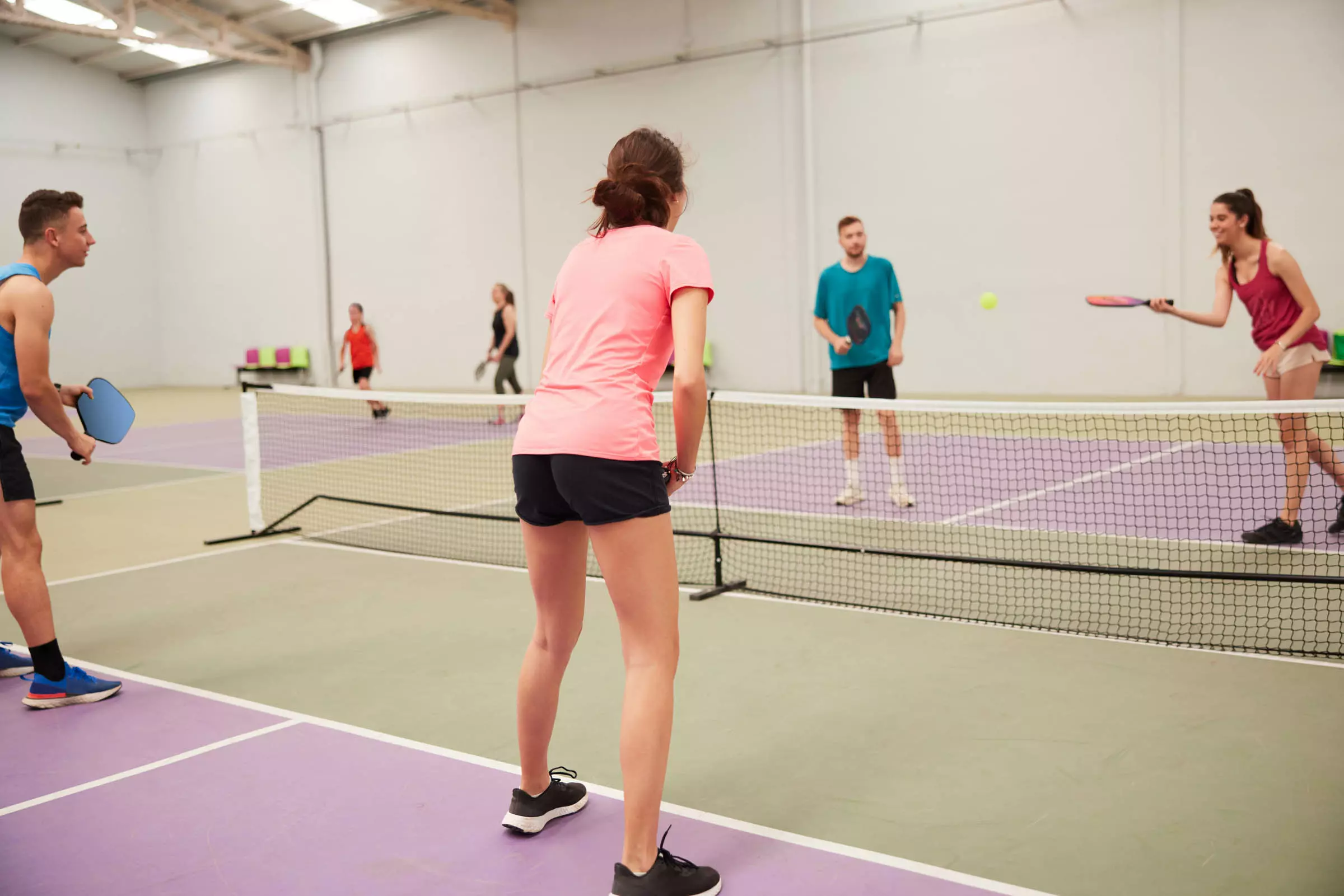 people playing indoor pickleball